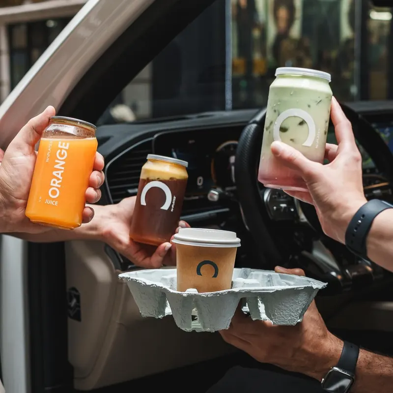 No Plates jars in a car cup holder